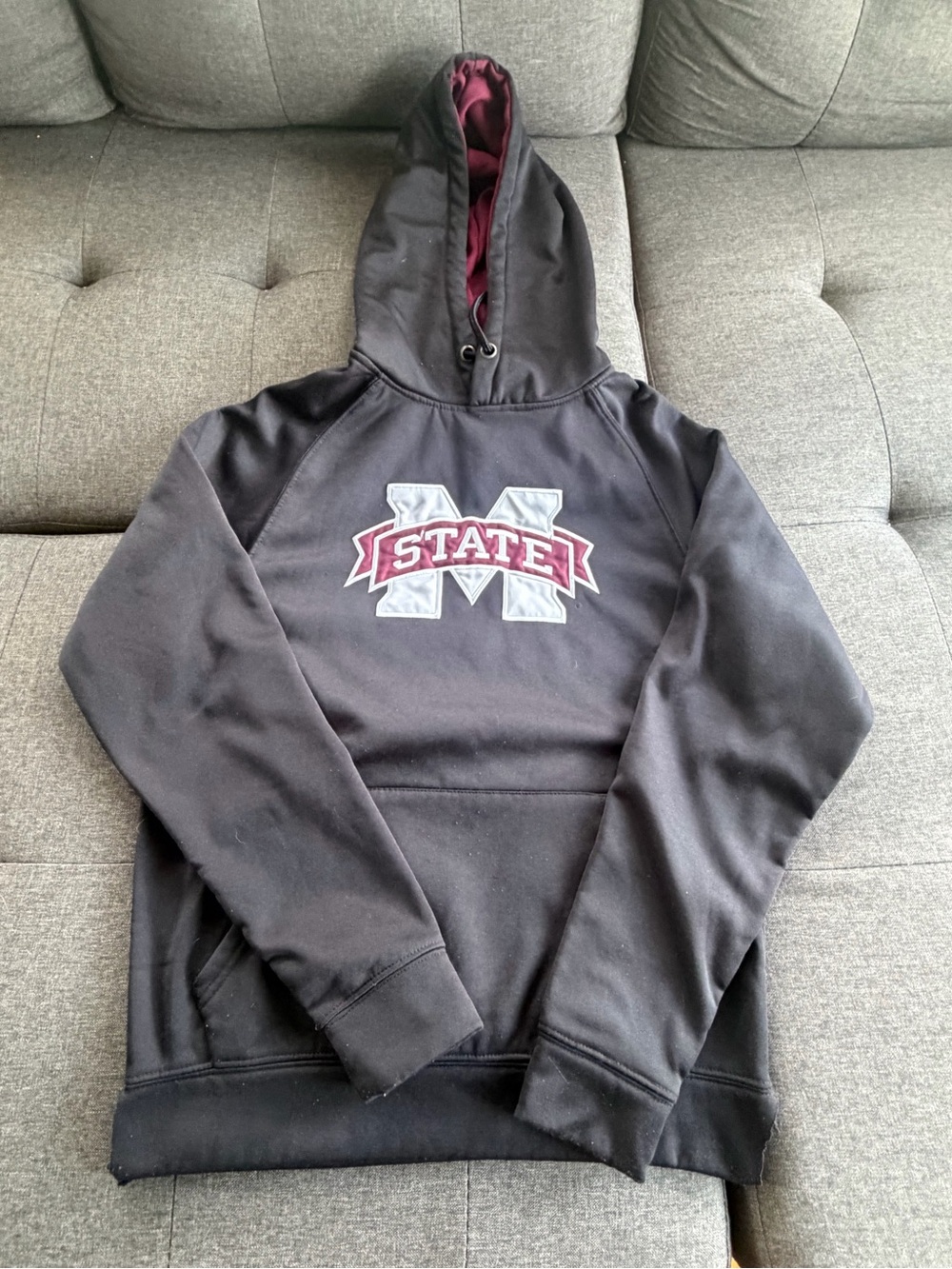 Colosseum Black Crewneck Hoodie with Maroon and White 'State' Logo